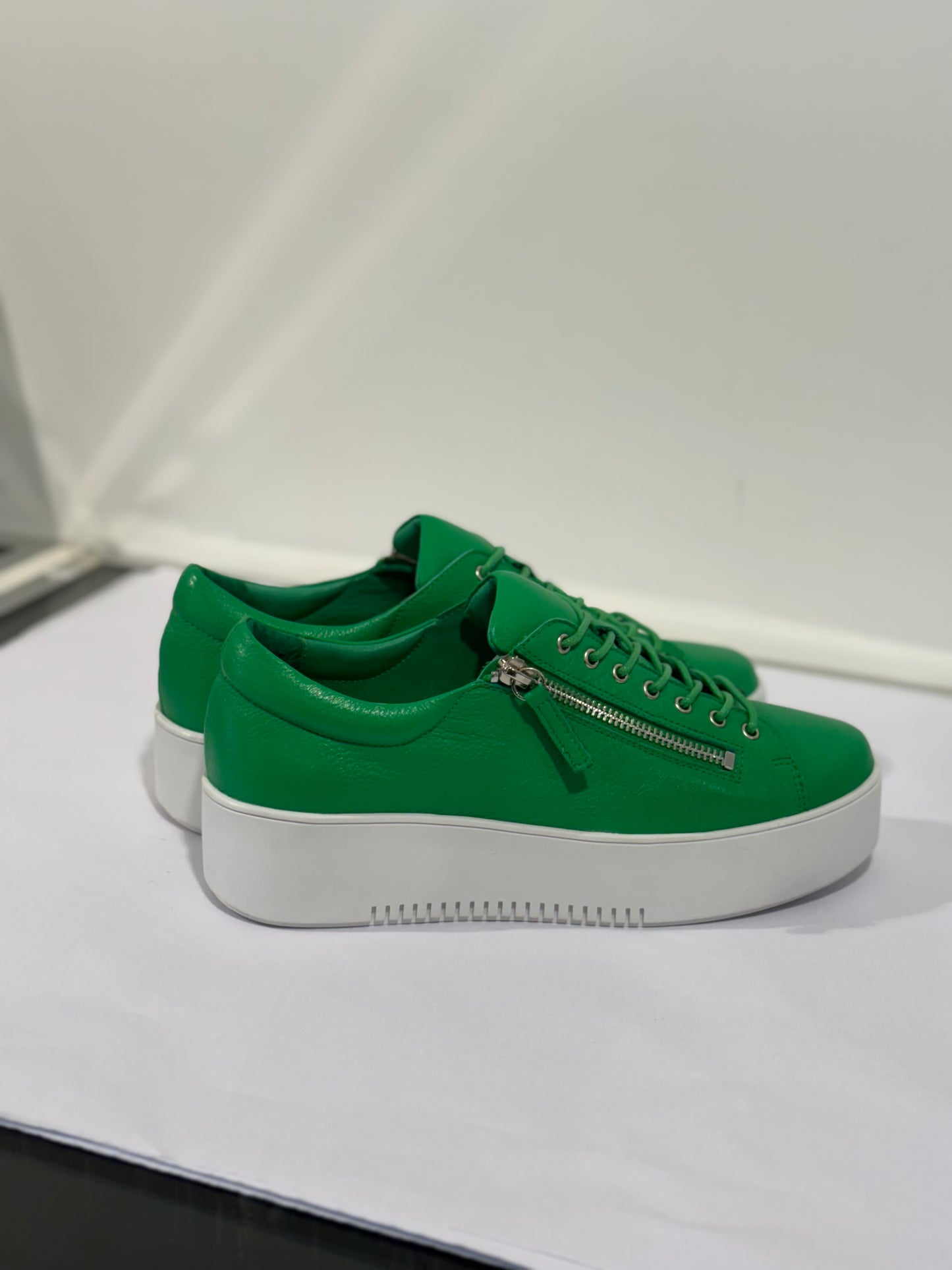 
                  
                    Wolfie Green Leather Sneakers
                  
                